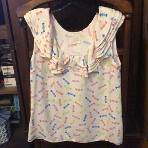 Top with blue, pink and green candies. Silk.